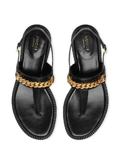 Shop Gucci Chain Thong Sandals In Black