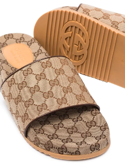 Shop Gucci Gg Canvas Slide Sandals In Brown