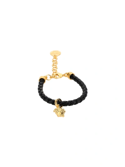 Shop Versace Bracelet In Nero-oro Caldo