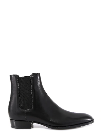 Shop Saint Laurent Wyatt Ankle Boots In Black