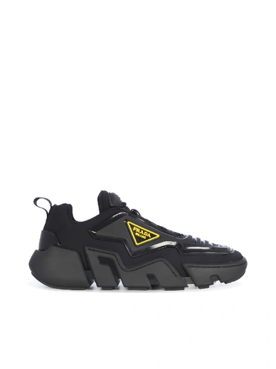 Shop Prada Segment Sneakers In G Black Gold