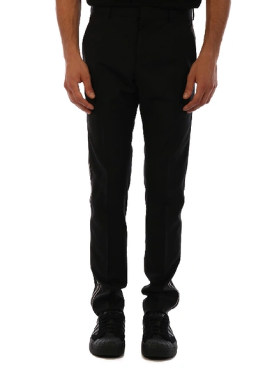 Shop Valentino Wool Trousers Black