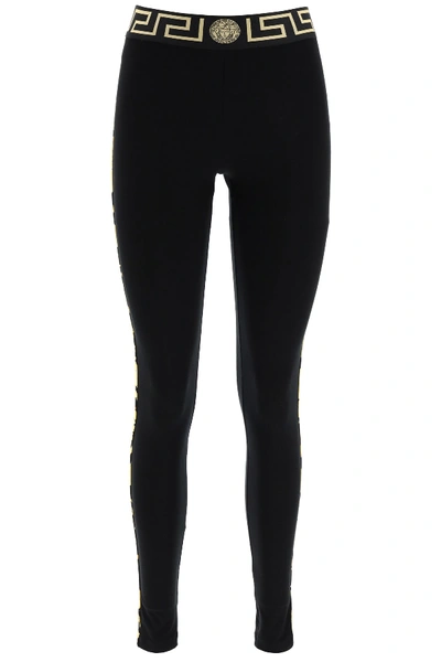 Shop Versace Leggings With Greca Motif In Nero (black)