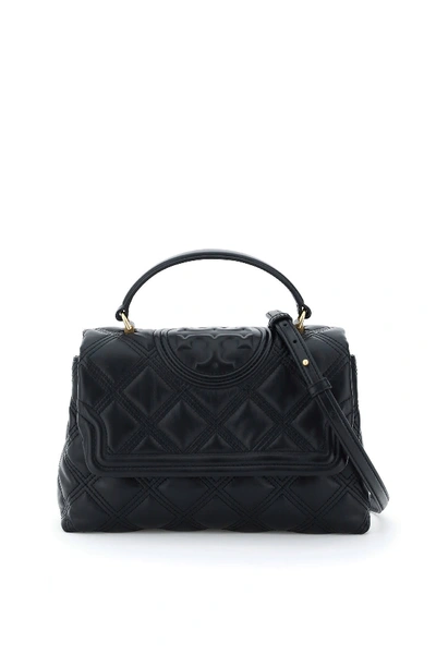 Shop Tory Burch Fleming Soft Quilted Top Handle Bag In Black (black)