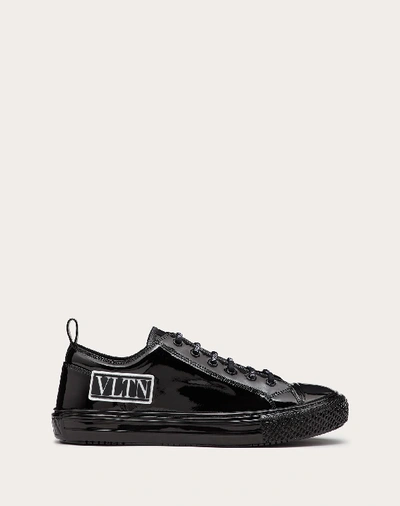 Shop Valentino Garavani Uomo Giggies Low-top Sneaker In Patent Calfskin In Black