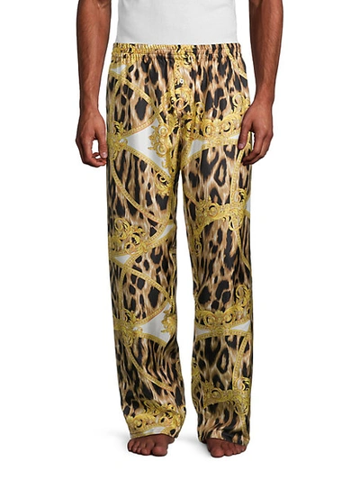 Shop Versace Signature-print Silk Pajama Pants In Gold Multi