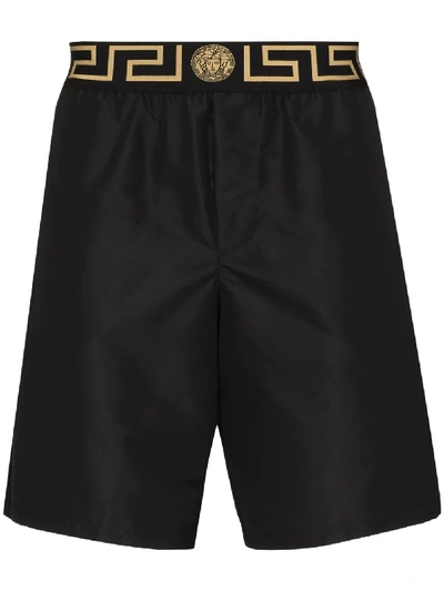 Shop Versace Greca Border Swim Shorts In Black