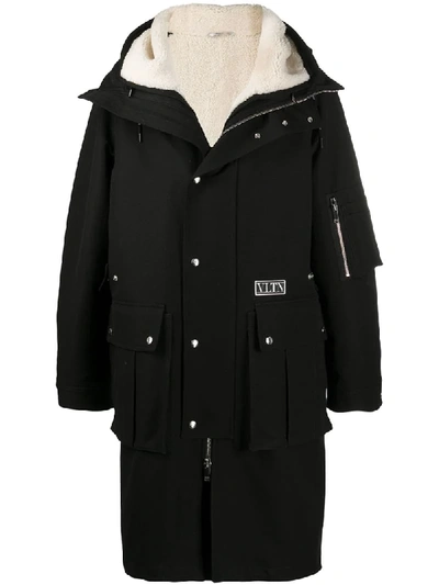 Shop Valentino Drawstring-hood Shearling Coat In Black