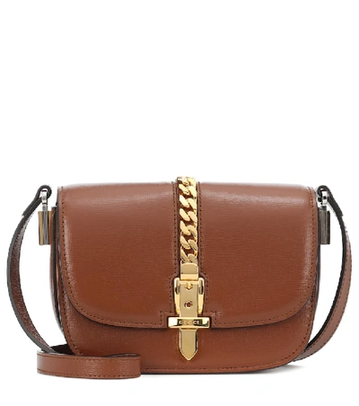 Shop Gucci Sylvie 1969 Mini Leather Shoulder Bag In Brown