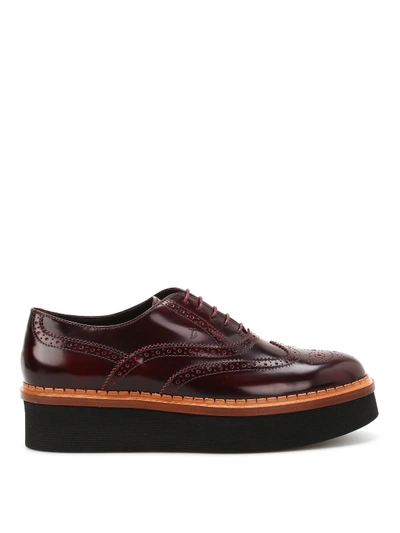 Shop Tod's Brogue Lace-ups With Chunky Sole In Dark Red