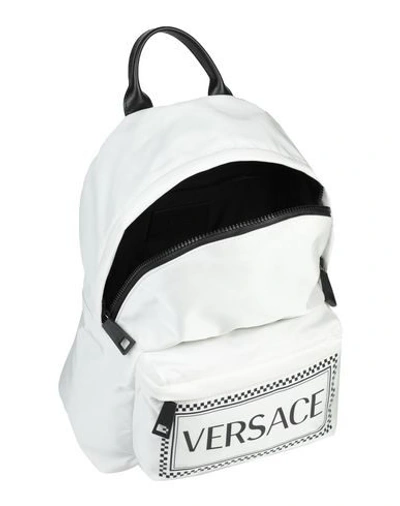 Shop Versace Backpacks In White