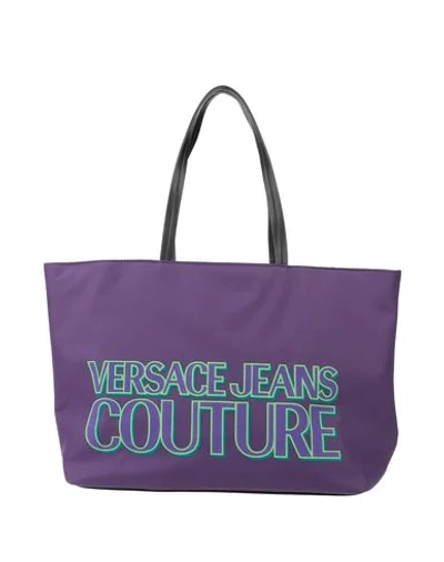 Shop Versace Jeans Handbags In Purple