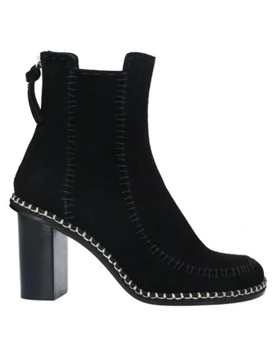 Shop Jw Anderson Ankle Boots In Black
