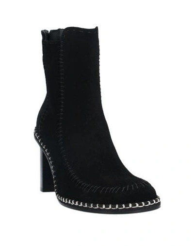 Shop Jw Anderson Ankle Boots In Black