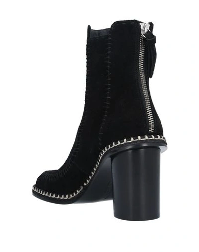 Shop Jw Anderson Ankle Boots In Black