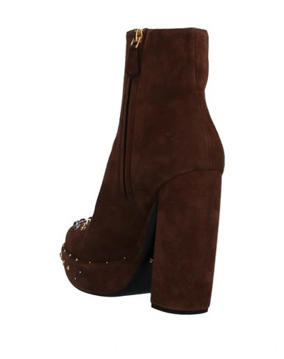 Shop Prada Ankle Boots In Dark Brown