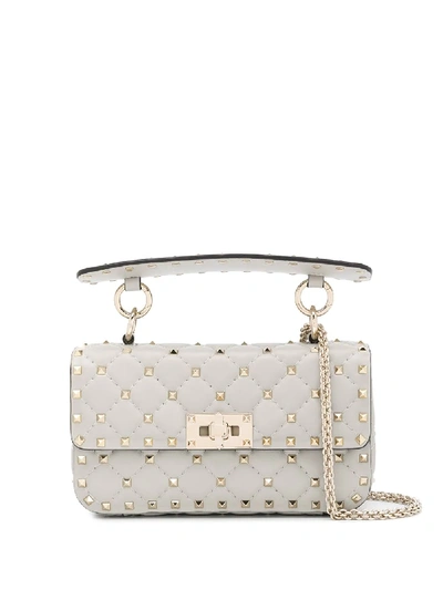 Shop Valentino Small Rockstud Spike Crossbody Bag In Grey