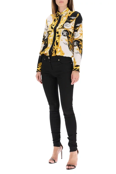 Shop Versace Bi-material Skinny Pants In Black