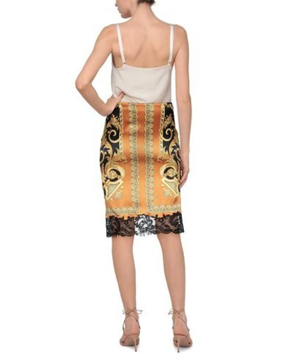 Shop Versace Midi Skirts In Yellow