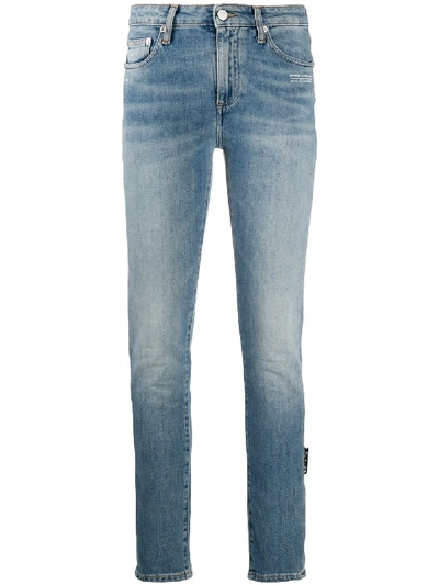 Shop Off-white Patch Detail Skinny Jeans In Blue