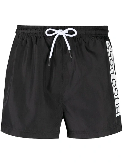 Shop Hugo Boss Logo Stripe Swim Shorts In Black