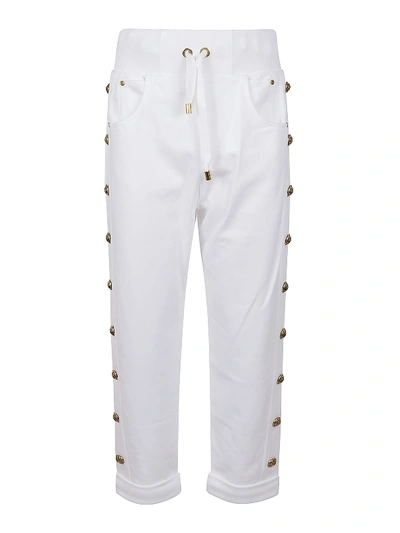 Shop Balmain Logo Buttons Embellished Pants In White