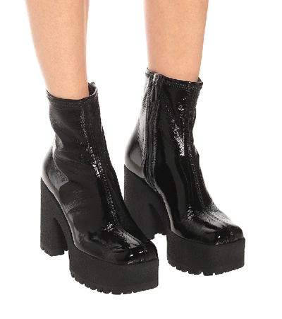 Shop Miu Miu Faux Leather Platform Ankle Boots In Black