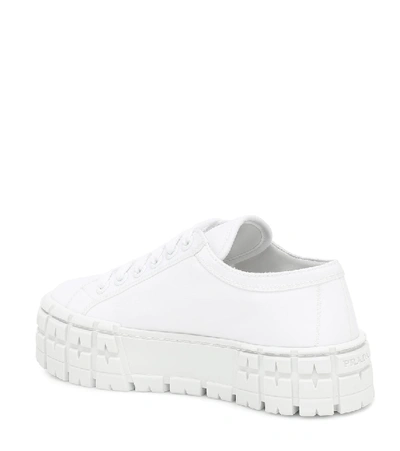 Shop Prada Wheel Gabardine Sneakers In White