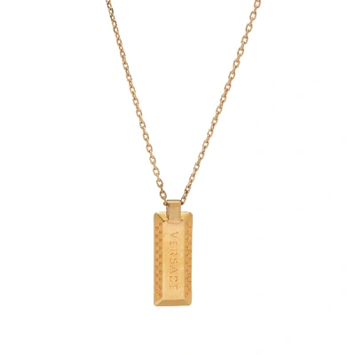 Shop Versace Logo Pendant And Necklace In Gold