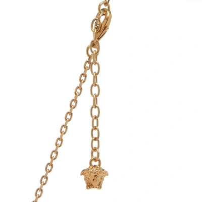 Shop Versace Logo Pendant And Necklace In Gold