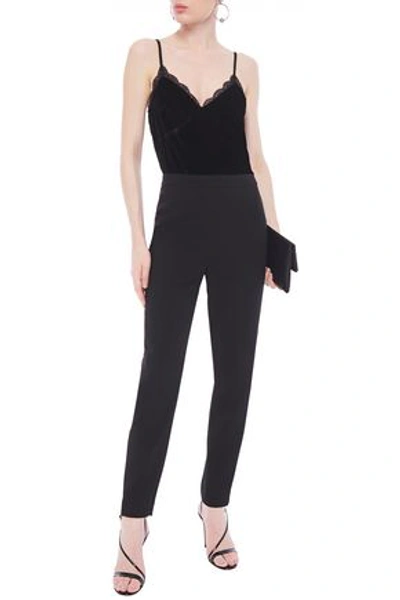 Shop Michael Michael Kors Lace-trimmed Velvet And Crepe Jumpsuit In Black
