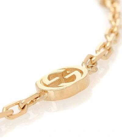 Shop Gucci Interlocking G 18kt Gold Bracelet