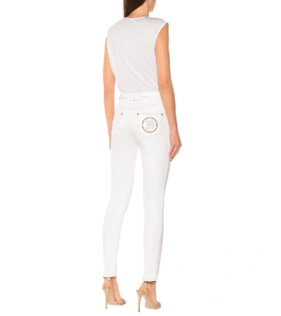Shop Balmain High-rise Skinny Jeans In White