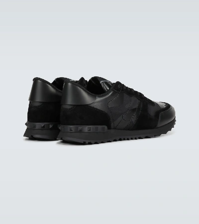 Shop Valentino Rockrunner Sneakers In Black
