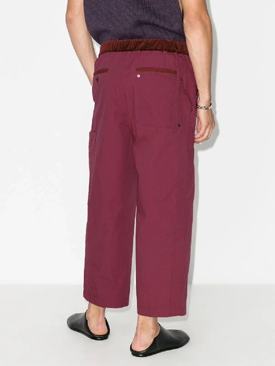 Shop Sacai Oxford Loose Fit Cropped Trousers In Pink