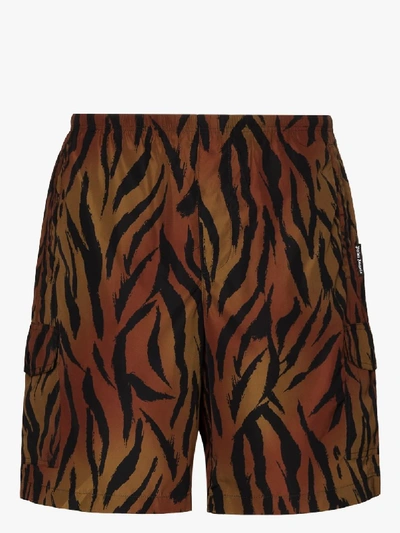 Shop Palm Angels Tiger Print Swim Shorts In Brown