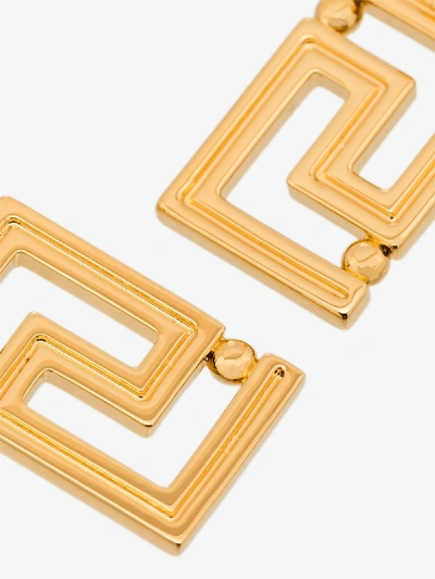 Shop Versace Greco Motif Earrings In Gold