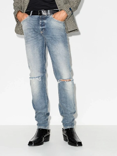 Shop Givenchy Distressed Straight Leg Jeans In Blue