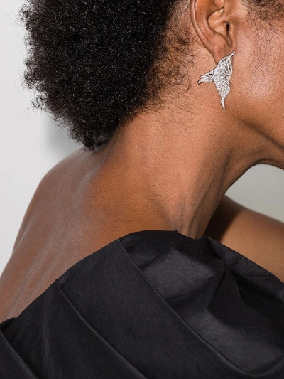 Shop Apples & Figs Sterling Silver Hermes Crystal Feather Earrings In Metallic