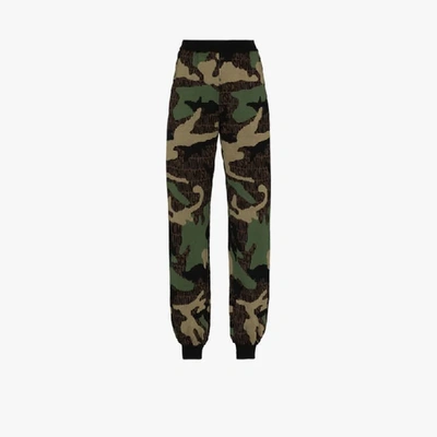 Shop Moschino Monogram Camo Knit Wool Track Pants In Green