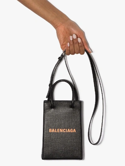 Shop Balenciaga 'shopping' Smartphone-tasche In Black