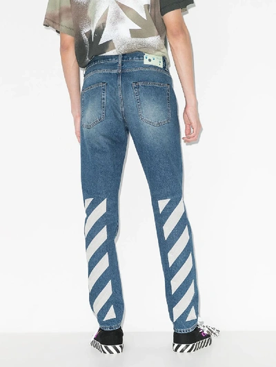 Shop Off-white Blue Diagonal Stripe Slim Jeans