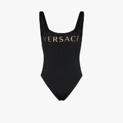 Shop Versace Logo Print Swimsuit In Black