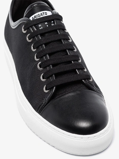 Shop Axel Arigato Cap Toe Low Top Sneakers In Black