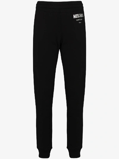 Shop Moschino Logo Detail Cotton Track Pants In Black