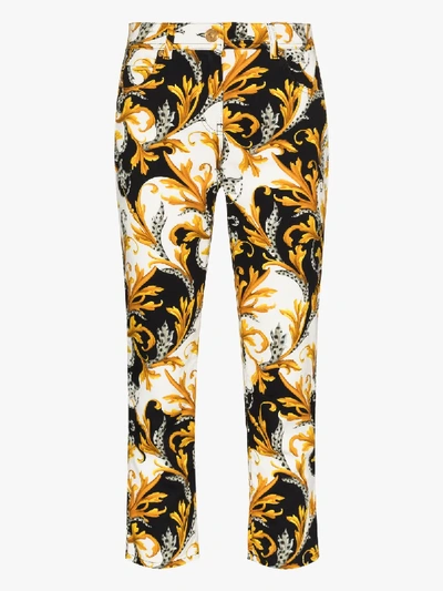 Shop Versace Baroque Print Cropped Jeans In White