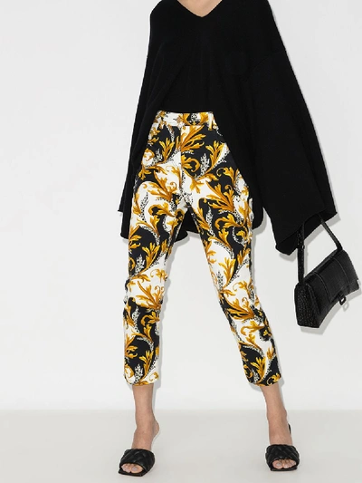 Shop Versace Baroque Print Cropped Jeans In White