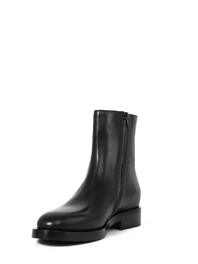 Shop Balenciaga Logo Ankle Boots In Black