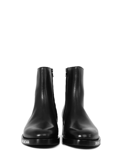 Shop Balenciaga Logo Ankle Boots In Black