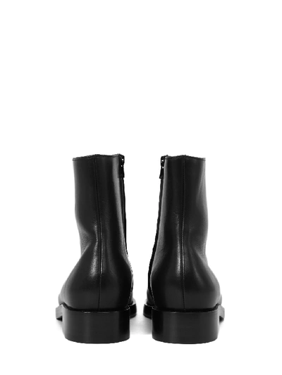 Shop Balenciaga Logo Ankle Boots In Black